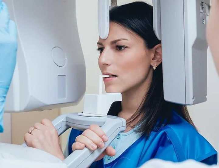 Patient being examined for dental implants
