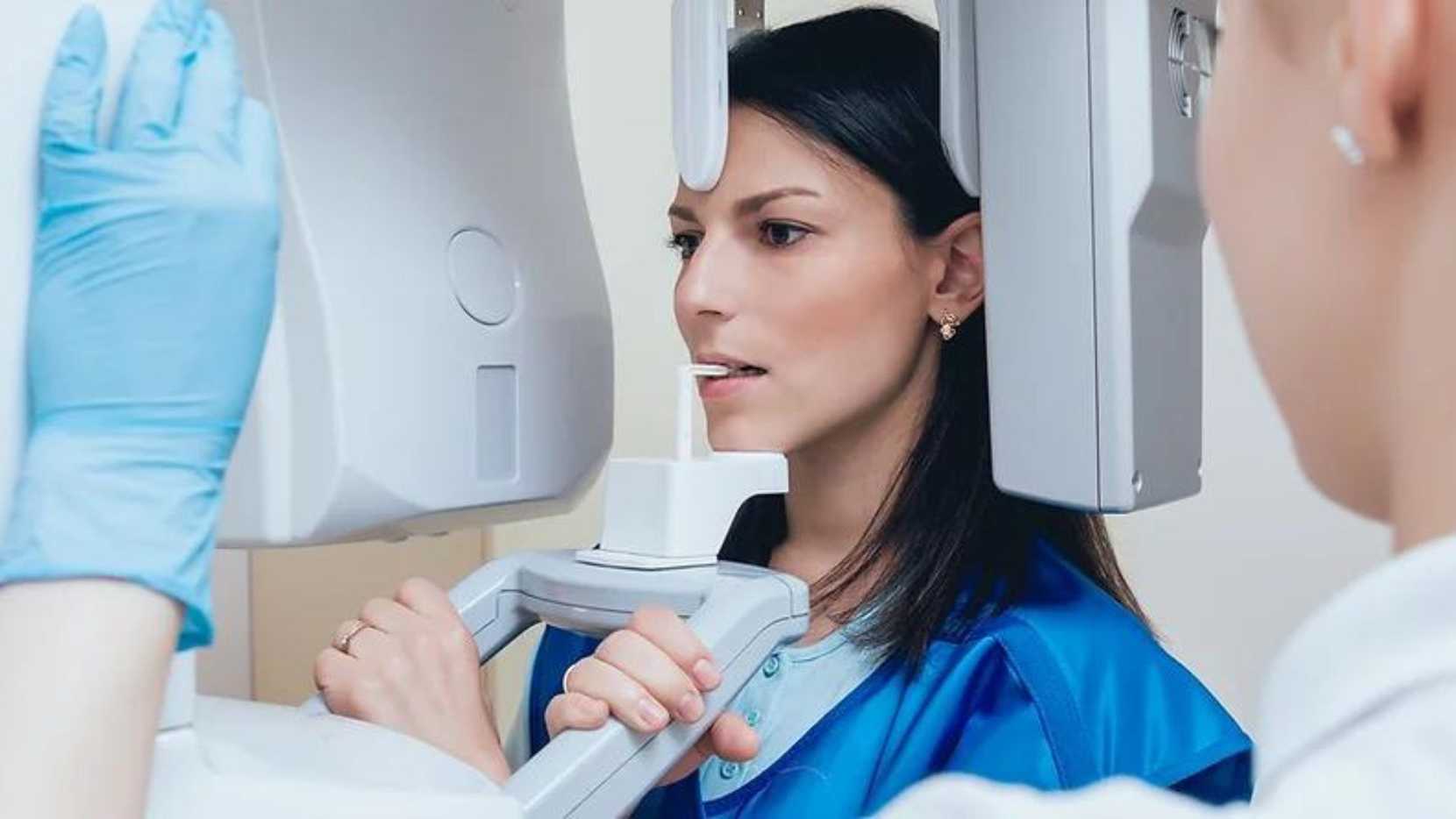 Patient being examined for dental implants