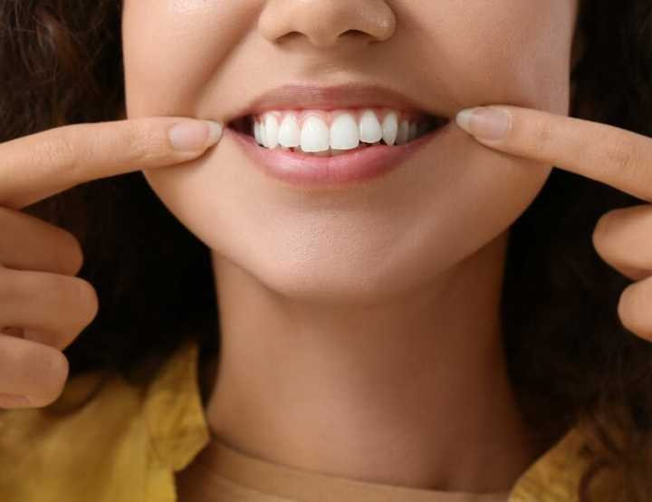 Happy client with dental inlays