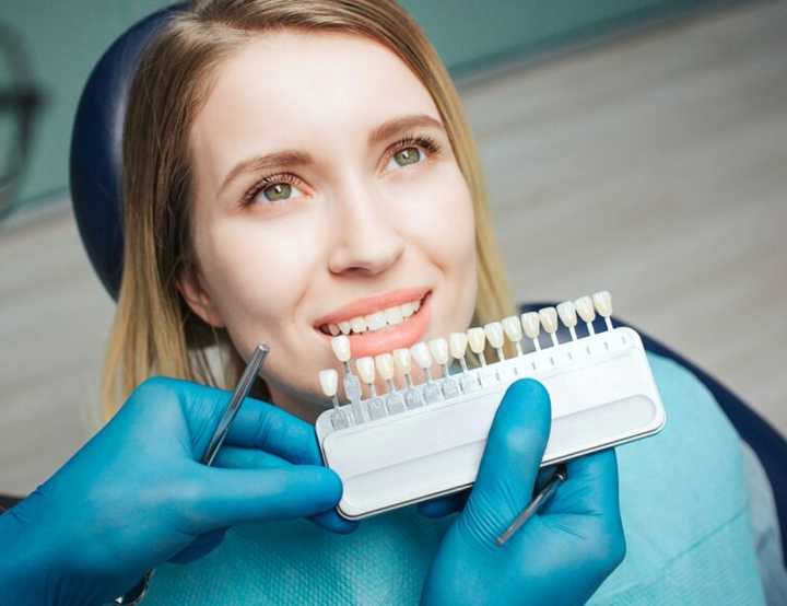 Patient choosing tooth colour