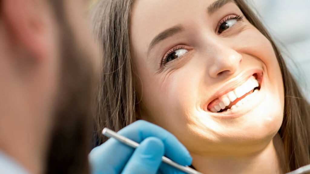 Patient smiling at our dentist