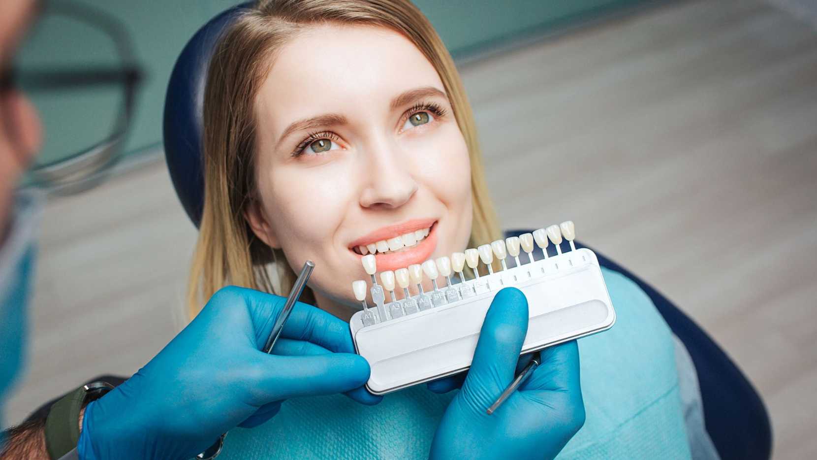 Patient choosing tooth colour